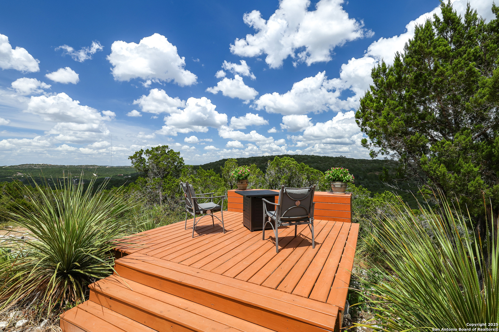 776 County Road 270 Mico, TX 78056 - Photo 12 of 59 a view of backyard with seating area and trees