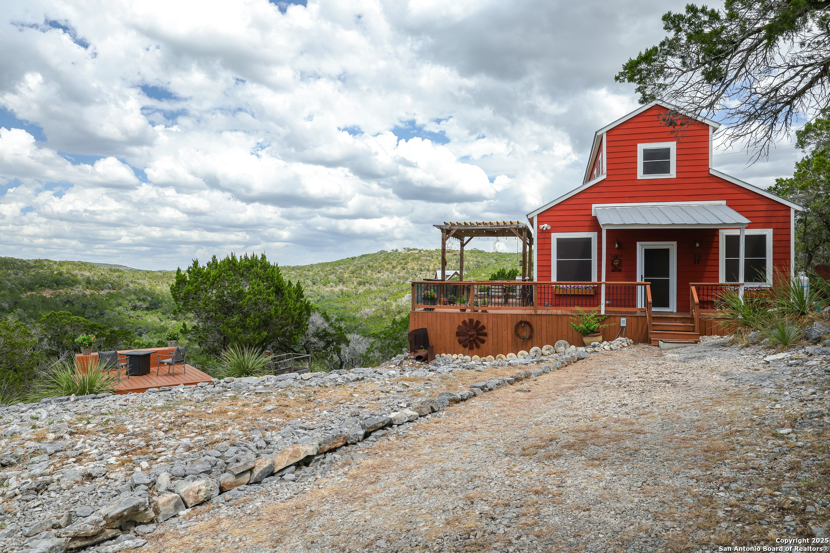 776 County Road 270 Mico, TX 78056 - Photo 4 of 59 a front view of a house with a yard