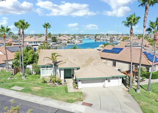 a aerial view of a house with garden space and street view