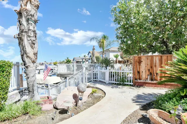 a view of a chair and tables in the patio