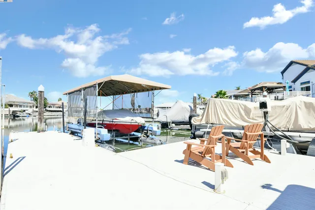 a outdoor space with lots of cars parked