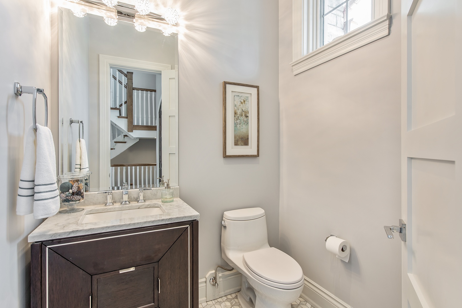 290 Thackeray Lane Northfield, IL 60093 - Photo 11 of 30 a bathroom with a sink toilet and mirror