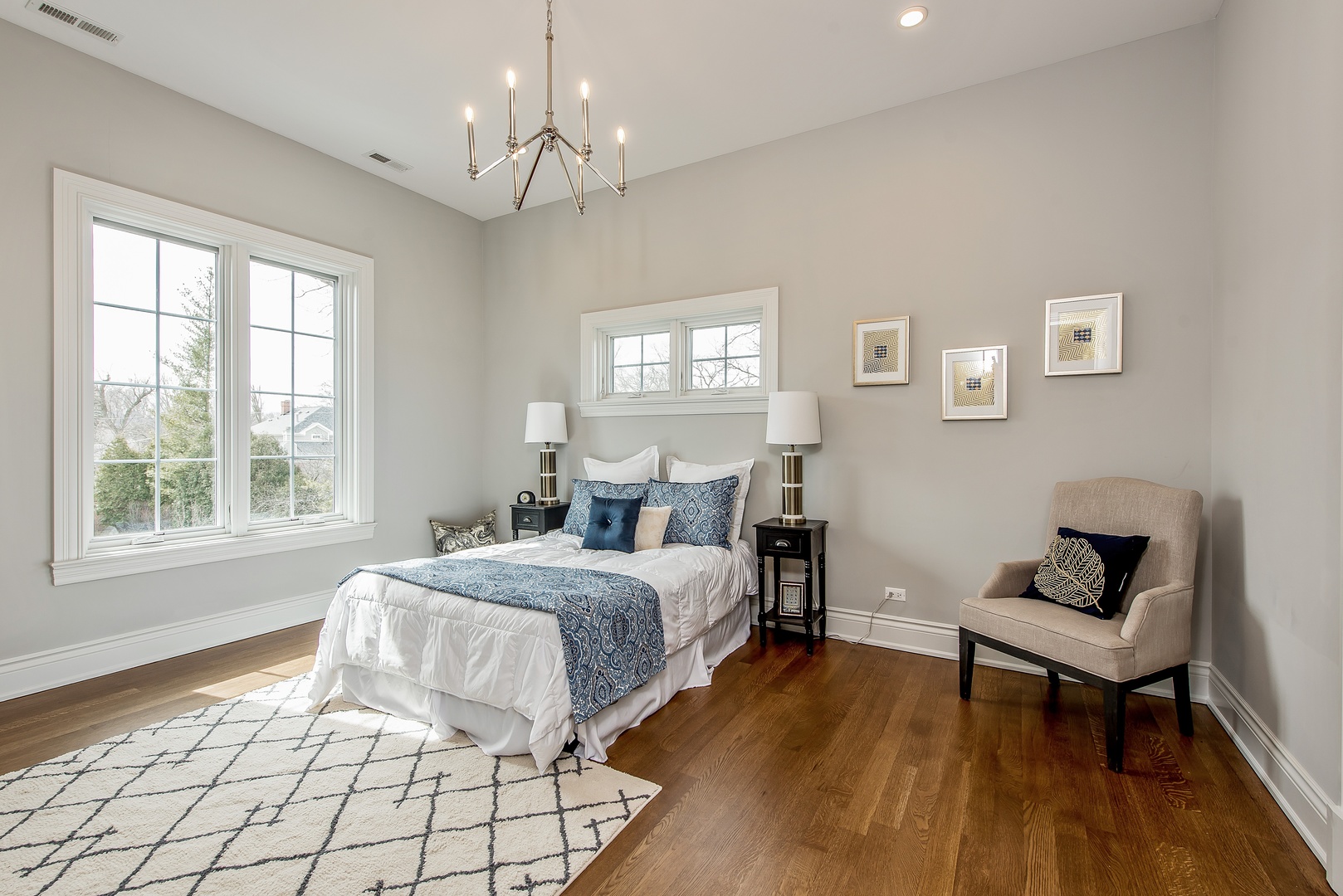 290 Thackeray Lane Northfield, IL 60093 - Photo 21 of 30 a spacious bedroom with a bed and a window