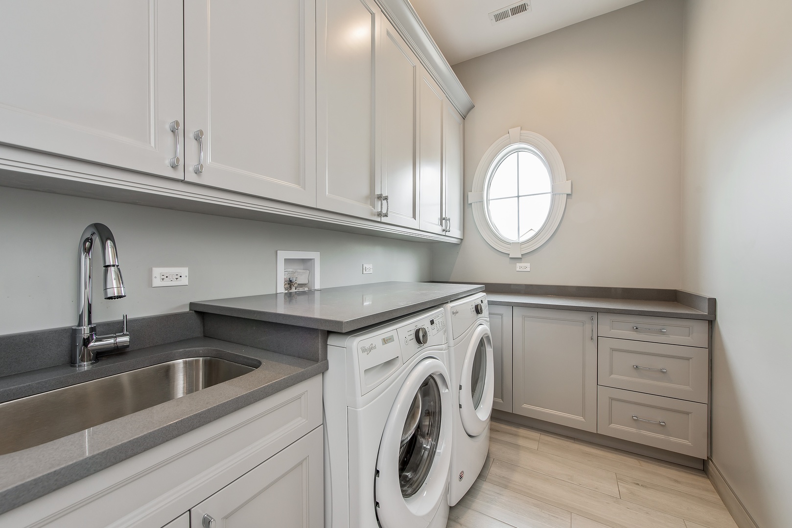 290 Thackeray Lane Northfield, IL 60093 - Photo 23 of 30 a utility room with sink dryer and washer