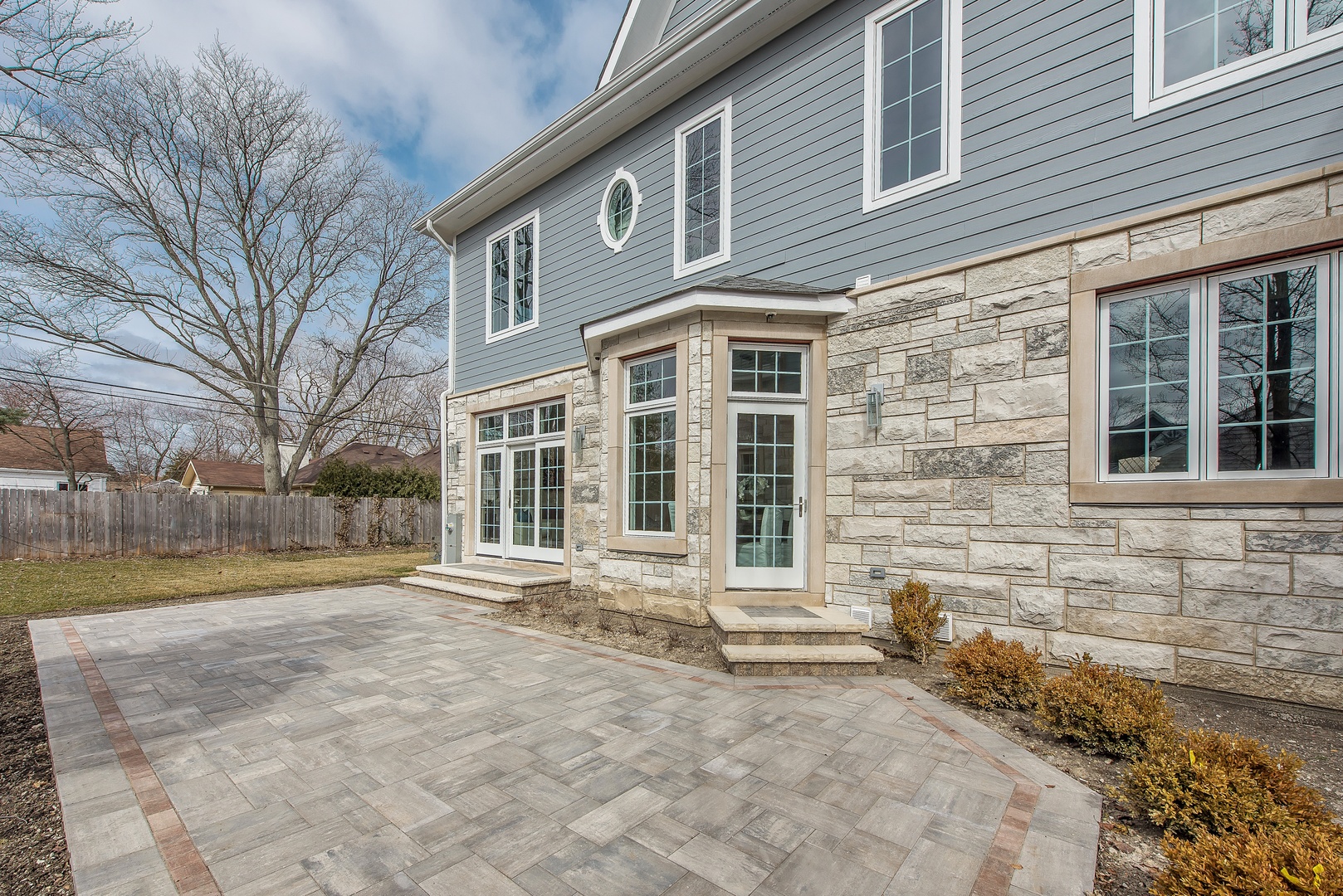 290 Thackeray Lane Northfield, IL 60093 - Photo 27 of 30 a front view of a house with a yard and garage