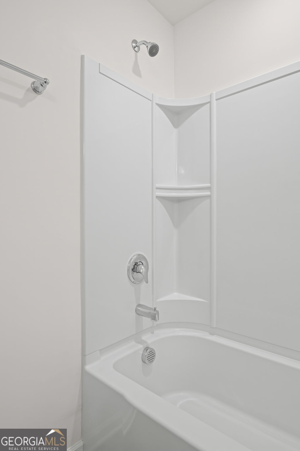 1002 Depot Street Cartersville, GA 30120 - Photo 20 of 29 a white bath tub sitting next to a shower