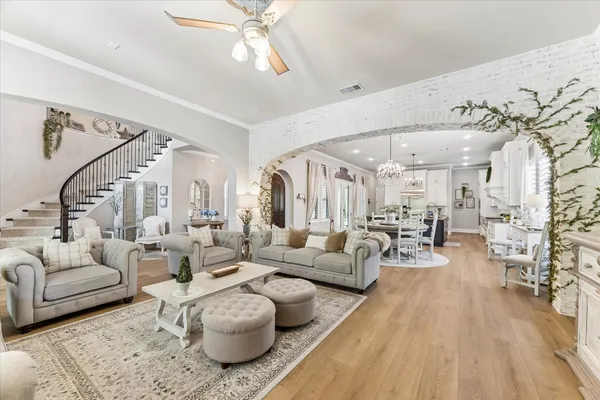 a living room with fireplace furniture and a flat screen tv