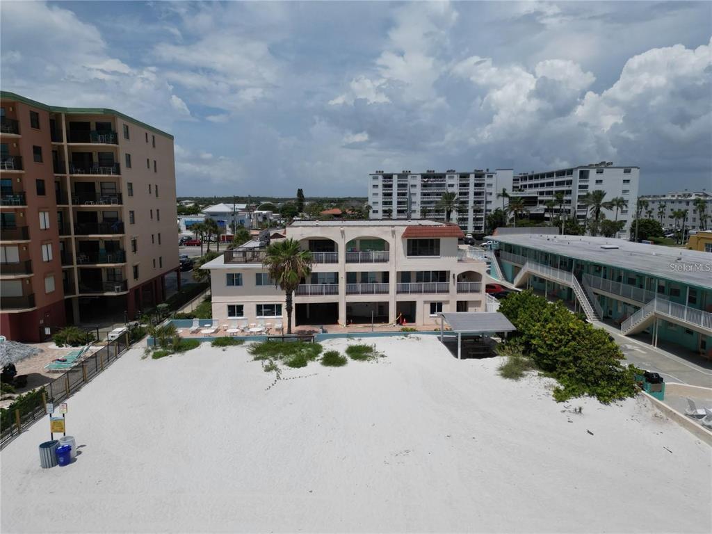 17300 Gulf Boulevard, Unit 9 North Redington Beach, FL 33708 - Photo 13 of 15 an aerial view of a house with a yard