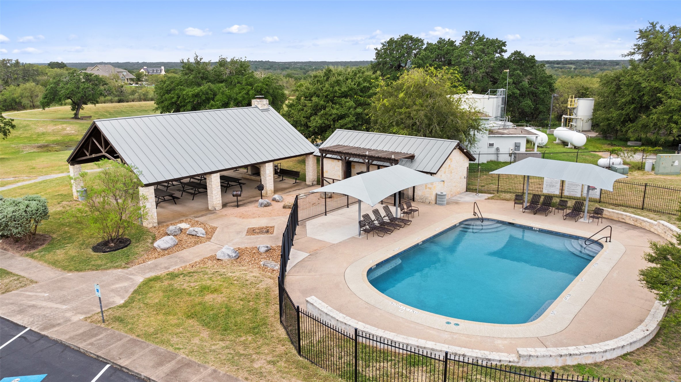 108 Cross Trail Spicewood, TX 78669 - Photo 24 of 33 Swimming pool featuring a patio, a gazebo, and outdoor grills for social gatherings