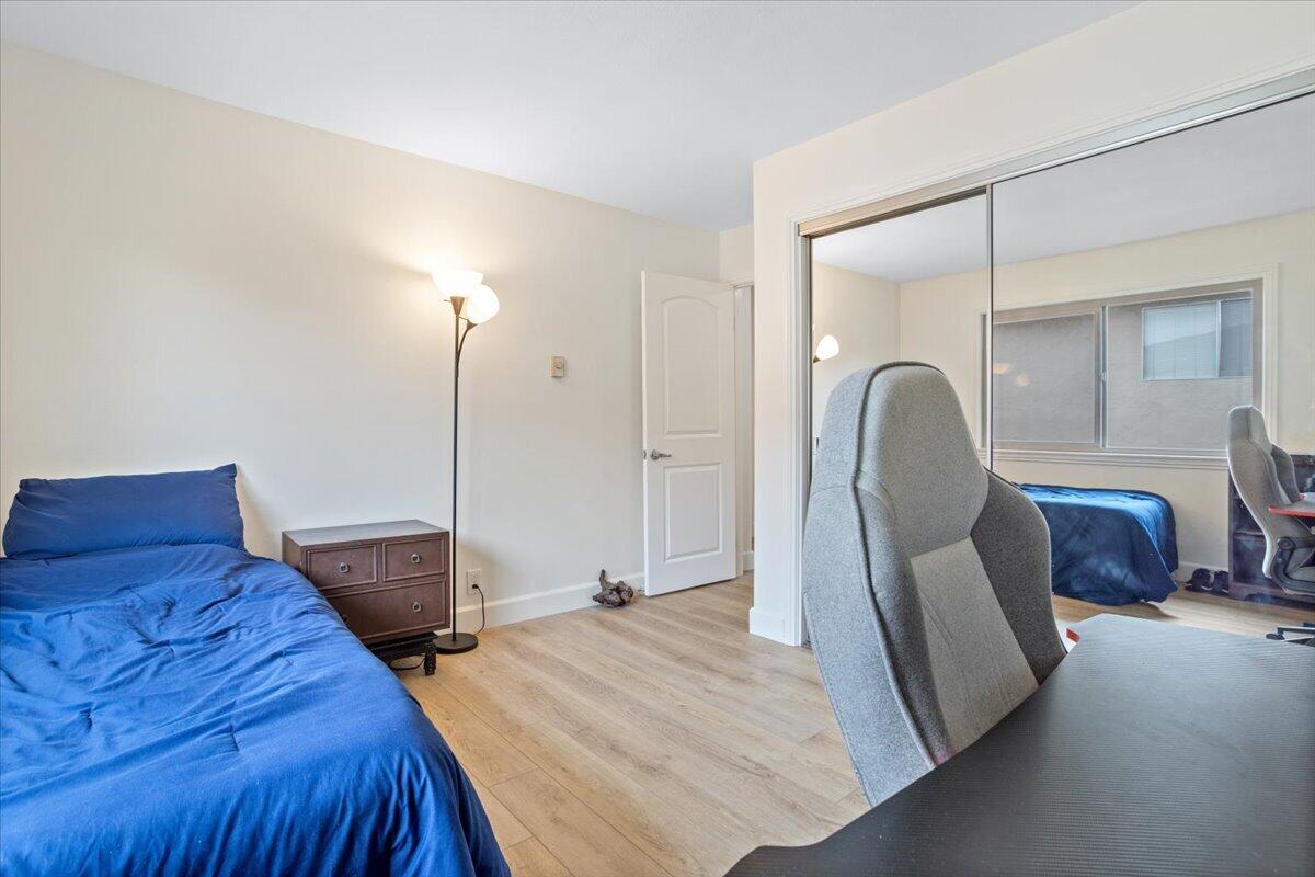 5930 Via Real, Unit 3 Carpinteria, CA 93013 - Photo 16 of 23 a bedroom with a bed window and mirror