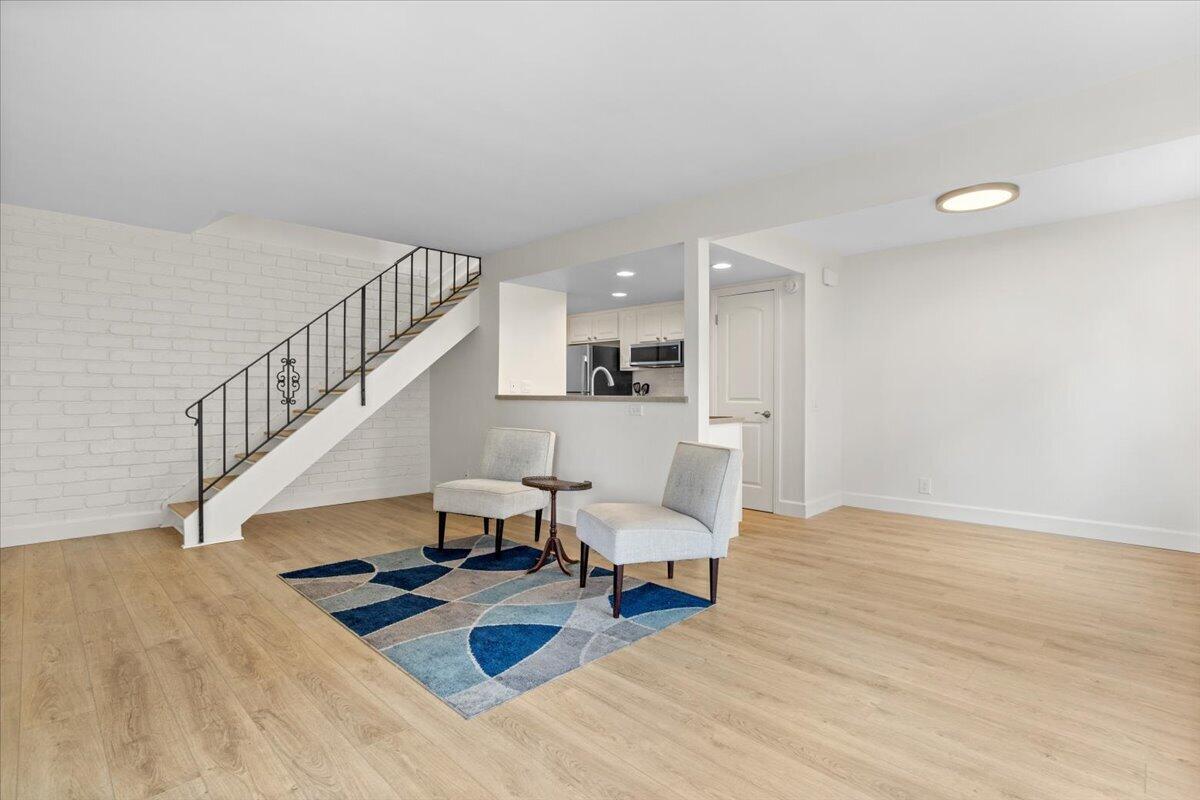 5930 Via Real, Unit 3 Carpinteria, CA 93013 - Photo 7 of 23 a living room with furniture and wooden floor