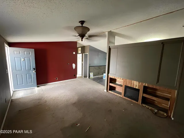 a furnished livingroom with a projector