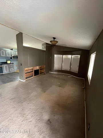 a view of a livingroom with a furniture