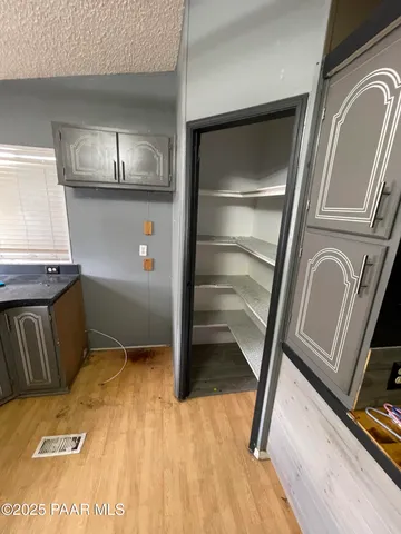 a view of a storage and utility room