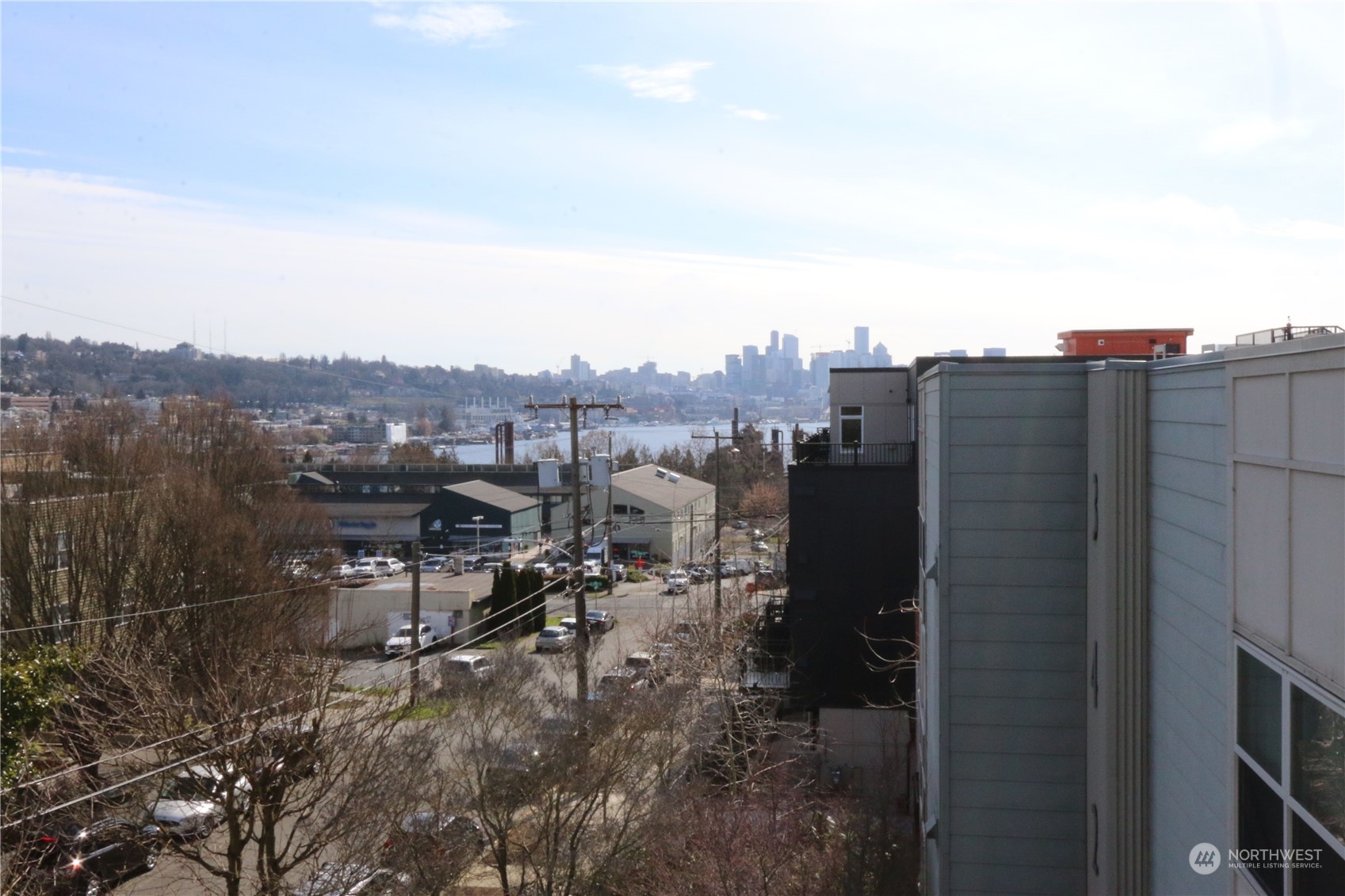 3435 Burke Avenue North Seattle, WA 98103 - Photo 19 of 21 a view of a terrace with a forest