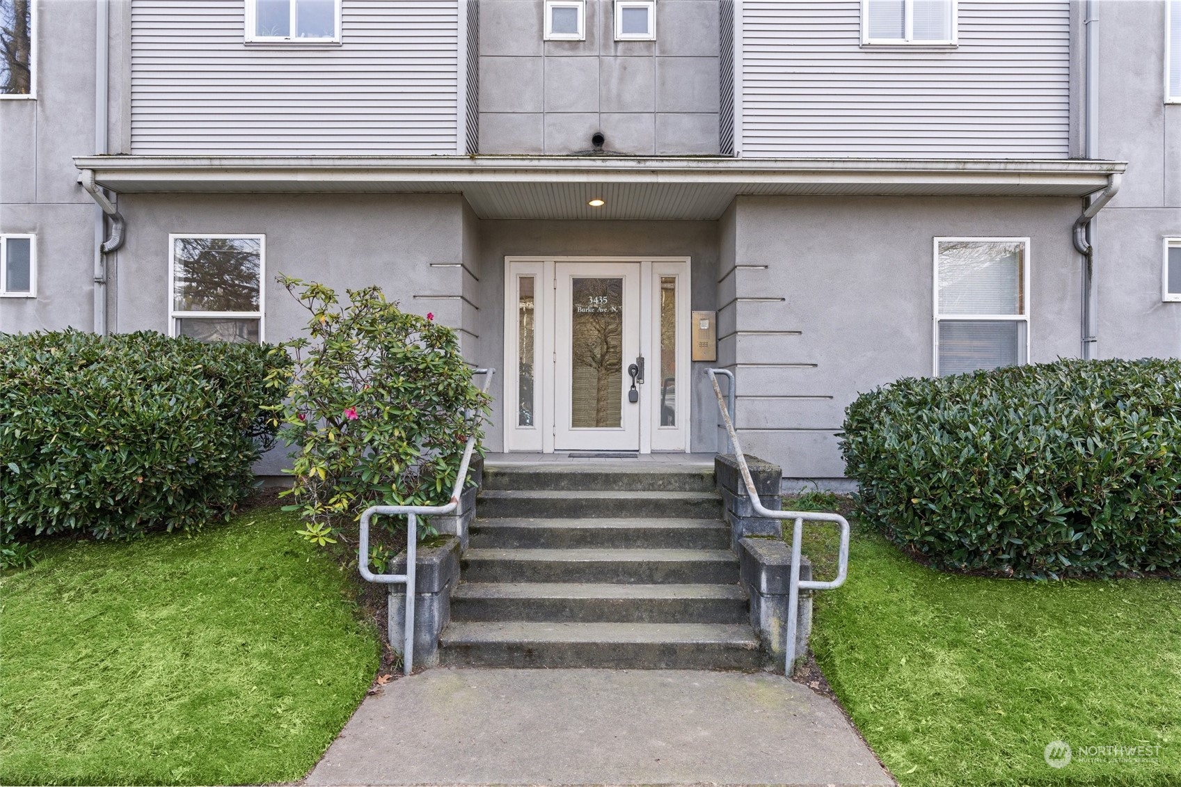 3435 Burke Avenue North Seattle, WA 98103 - Photo 3 of 21 a view of a house with a yard