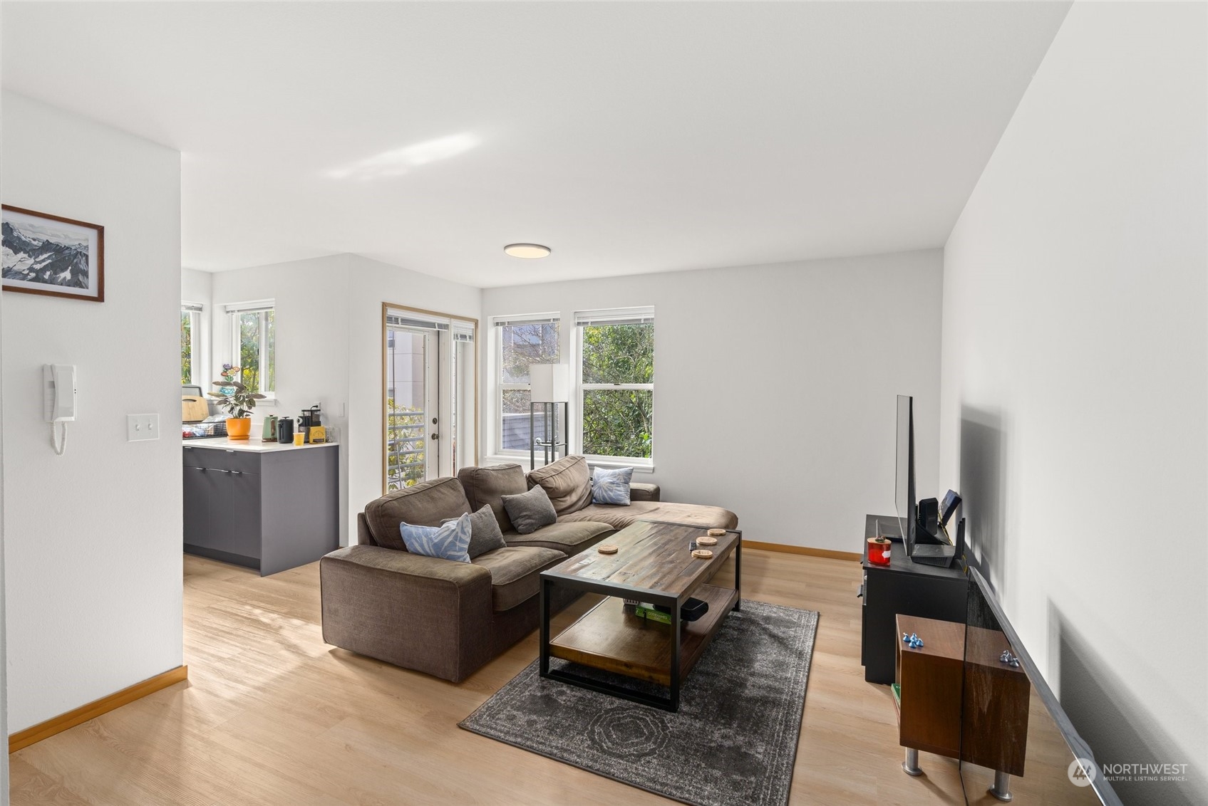 3435 Burke Avenue North Seattle, WA 98103 - Photo 8 of 21 a living room with furniture and a window