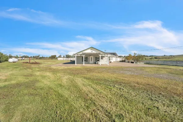 a view of a lake from a yard