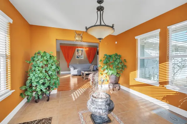 a bedroom with a bed and a table