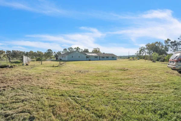a house view with a outdoor space