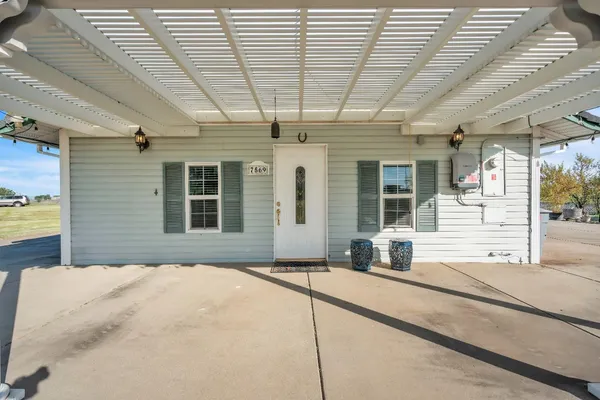 a view of houses with outdoor space and swimming pool