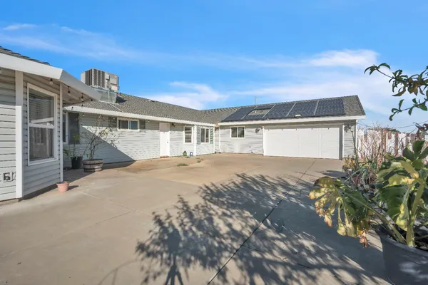 a view of a lake with a yard