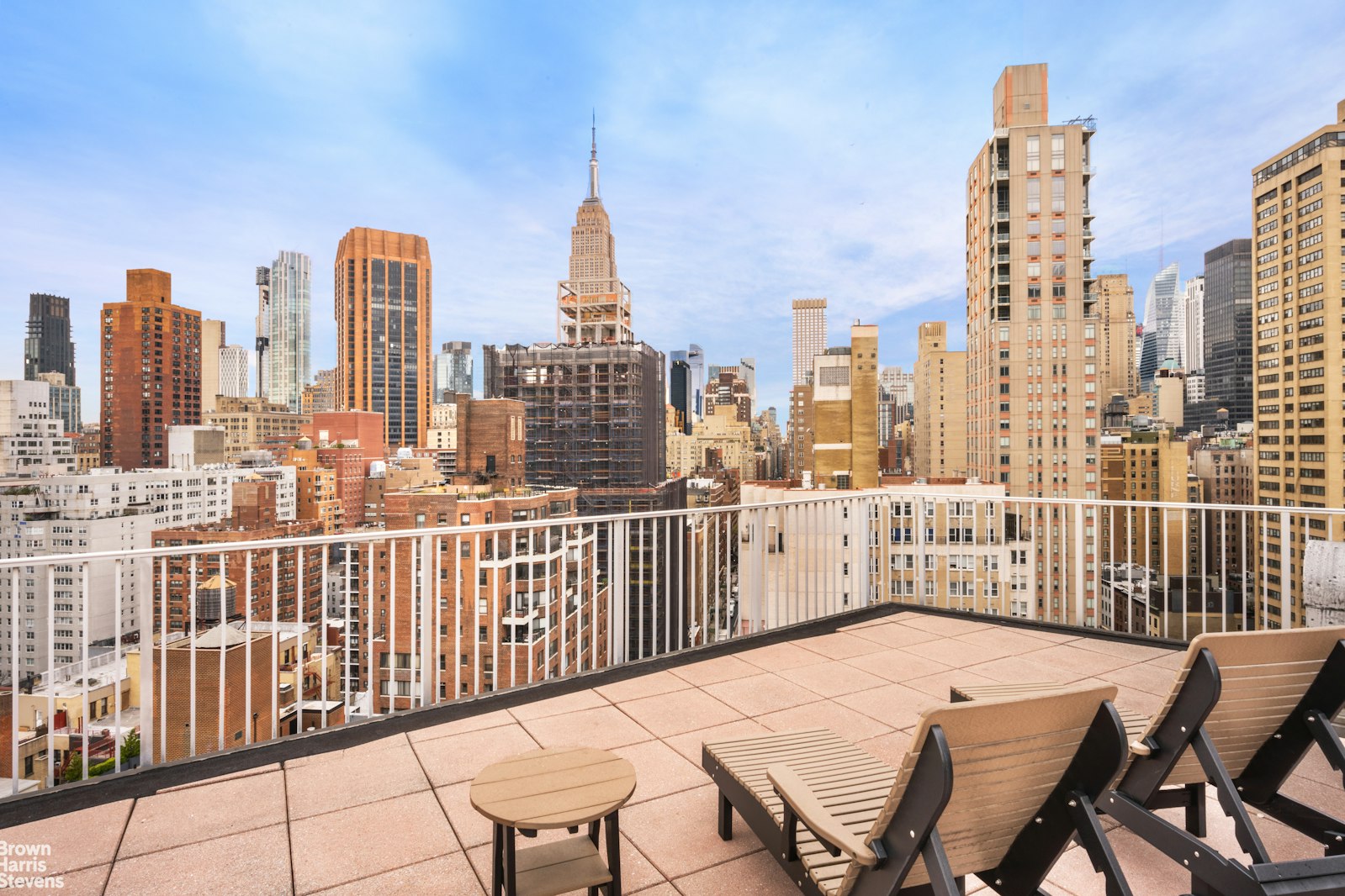 225 East 36th Street, Unit 5C Manhattan, NY 10016 - Photo 5 of 7 a view of a city from a roof deck