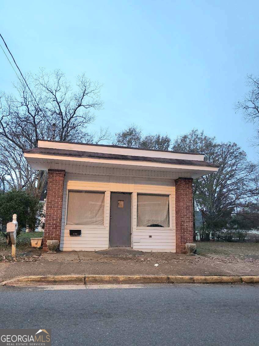 109 F Avenue Thomaston, GA 30286 - Photo 11 of 25 a view of a house with a outdoor space