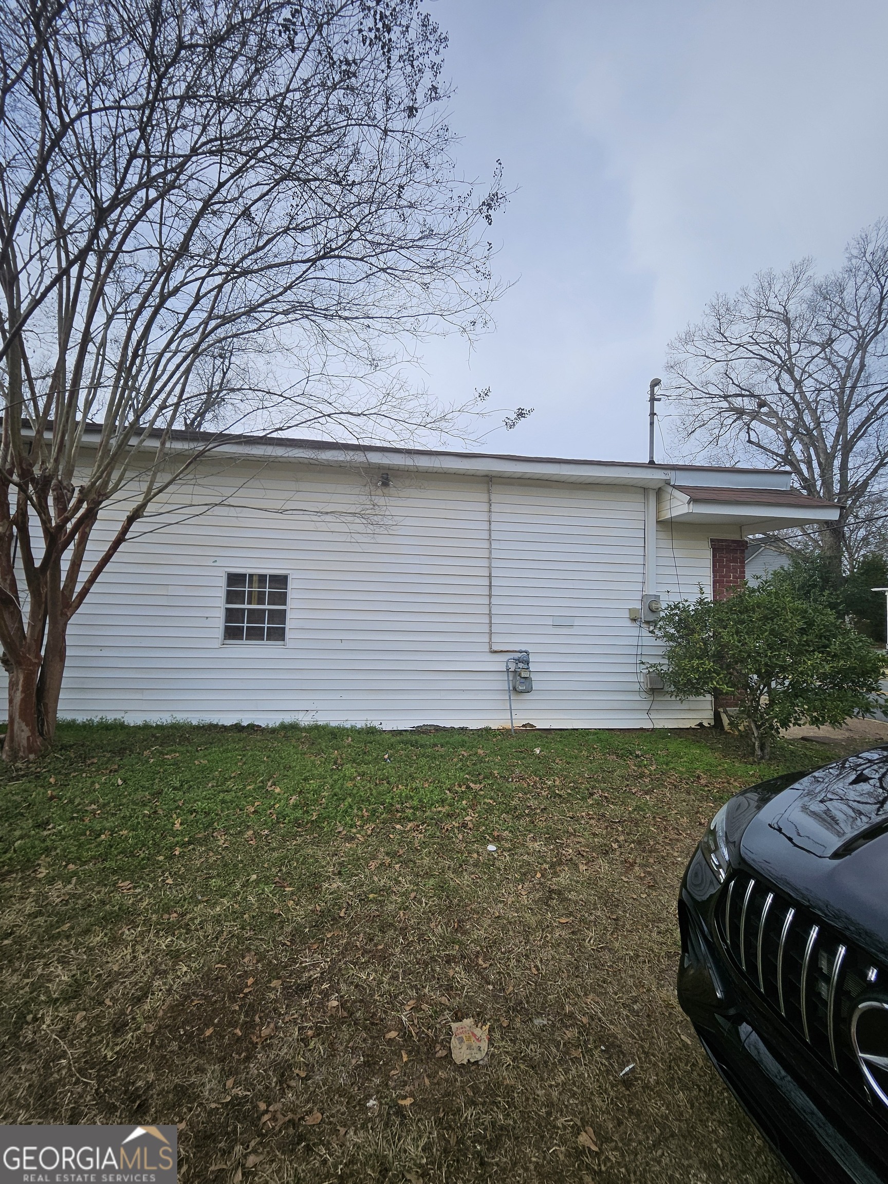 109 F Avenue Thomaston, GA 30286 - Photo 15 of 25 a backyard of a house with lots of green space