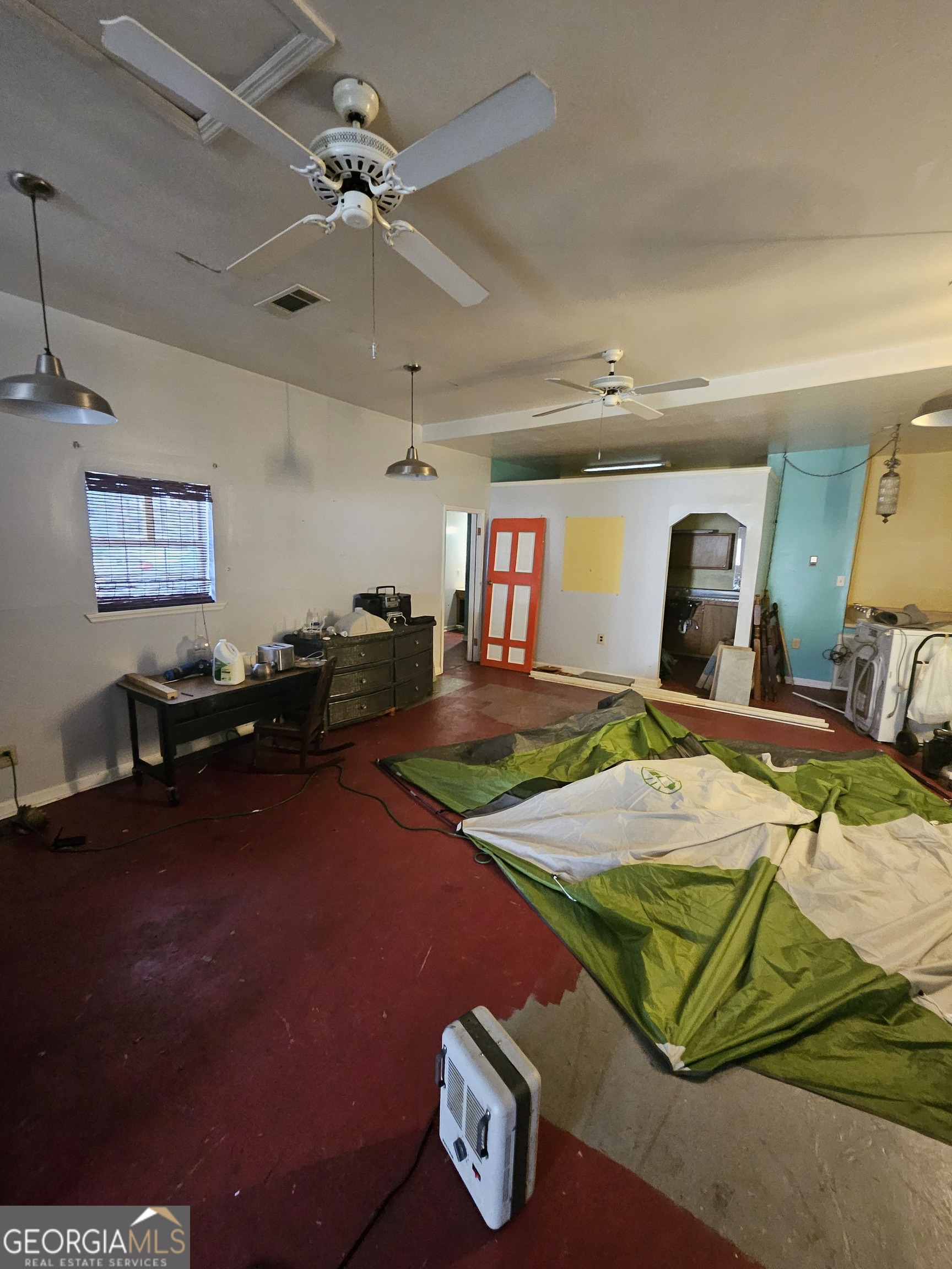 109 F Avenue Thomaston, GA 30286 - Photo 18 of 25 a room with furniture and a ceiling fan