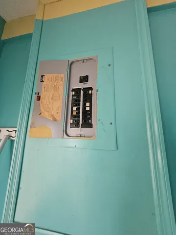 a view of a workspace with furniture