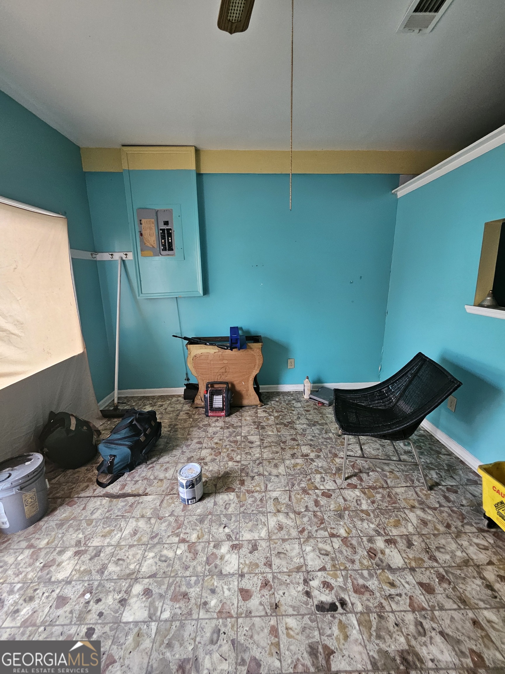 109 F Avenue Thomaston, GA 30286 - Photo 20 of 25 a bed room with a bed and a chair