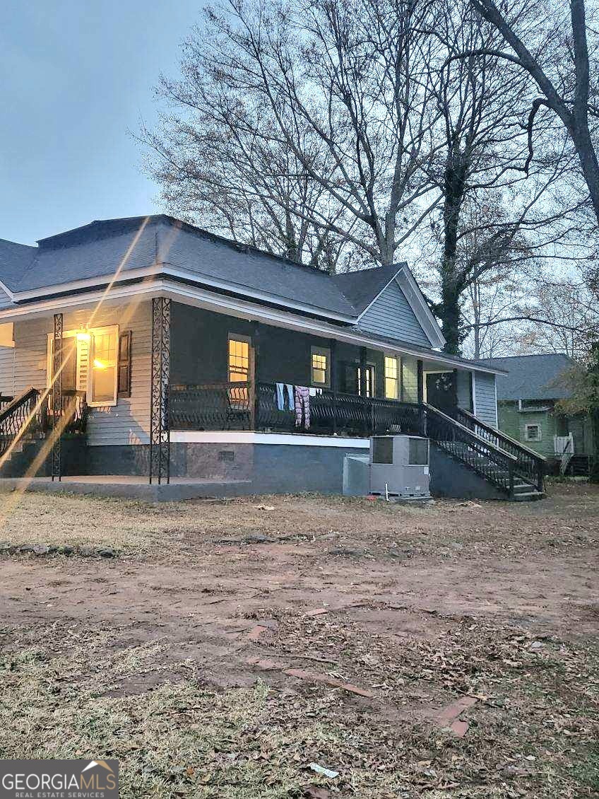 109 F Avenue Thomaston, GA 30286 - Photo 2 of 25 a view of house with outdoor space