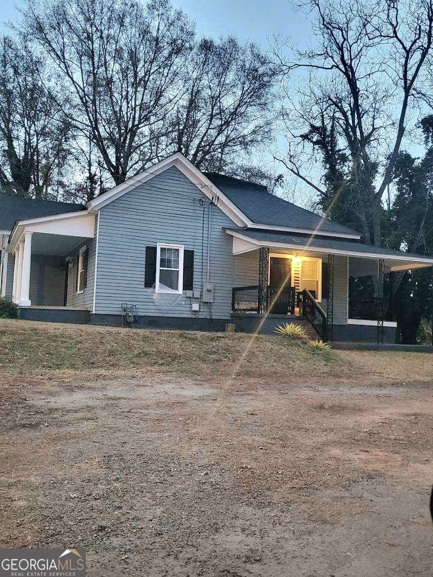 109 F Avenue Thomaston, GA 30286 - Photo 3 of 25 a front view of a house with garden