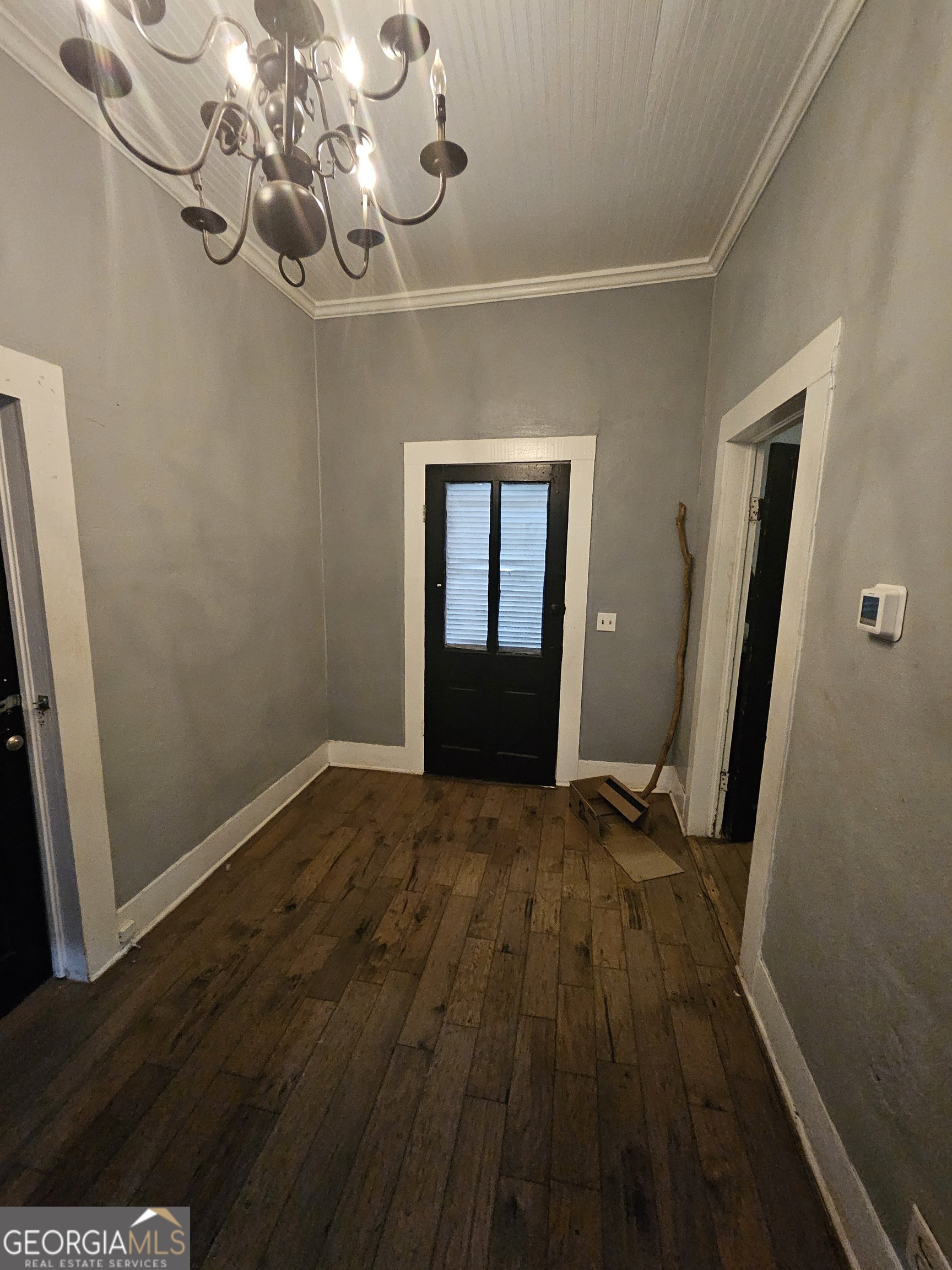 109 F Avenue Thomaston, GA 30286 - Photo 10 of 25 a view of empty room with wooden floor