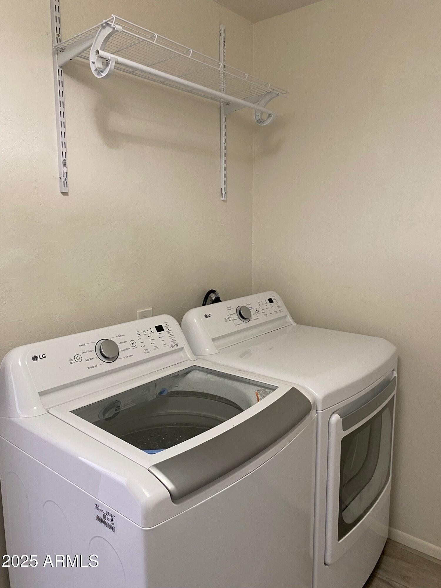 1821 West Libby Street Phoenix, AZ 85023 - Photo 21 of 26 a utility room with dryer and washer
