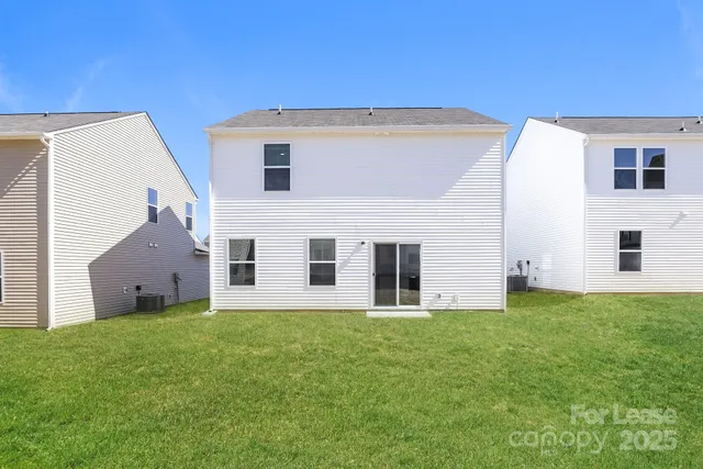 a house view with a garden space