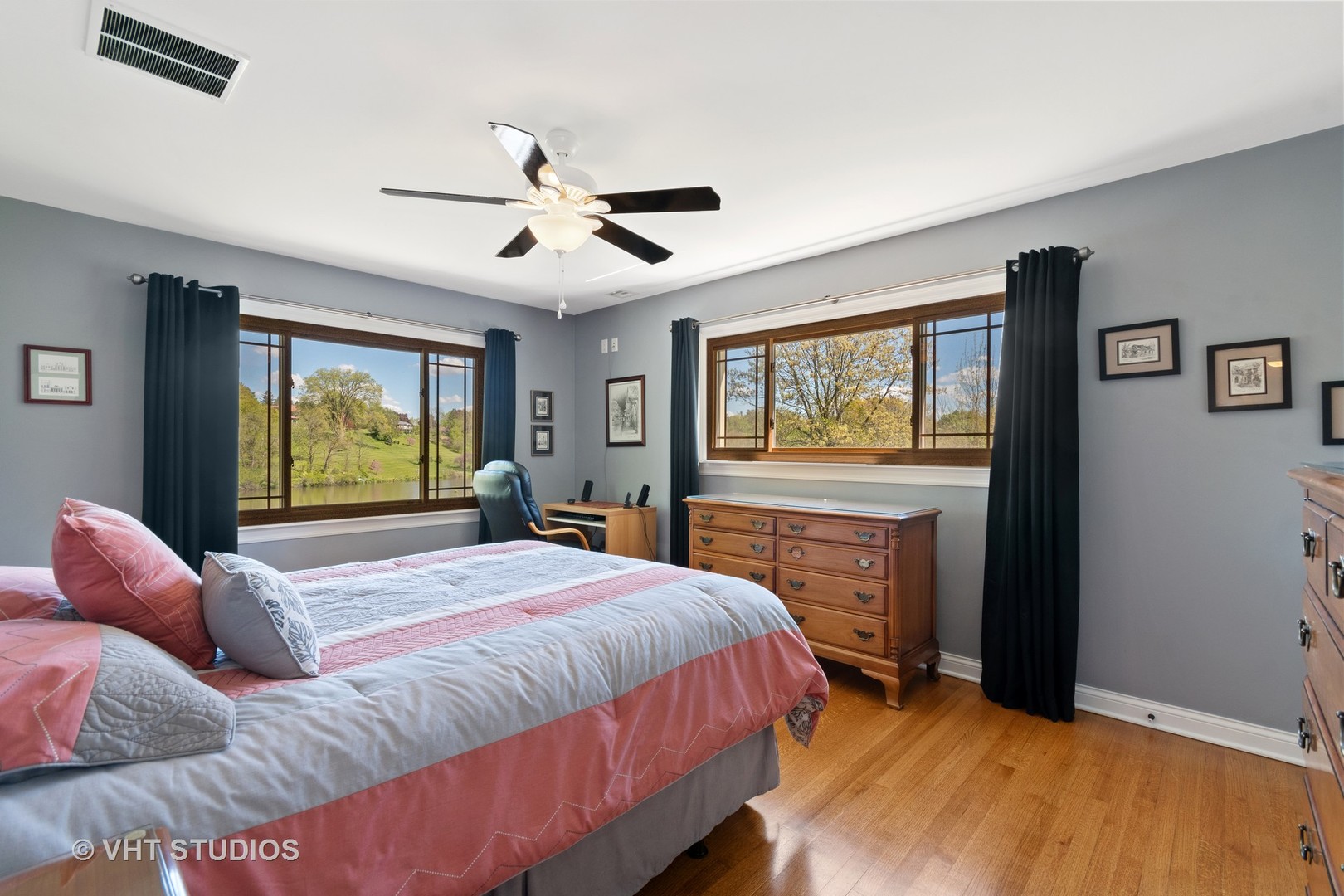 41W202 Whitney Road St. Charles, IL 60175 - Photo 22 of 33 a bedroom with a bed and a flat screen tv