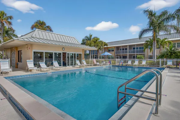a view of a house with swimming pool