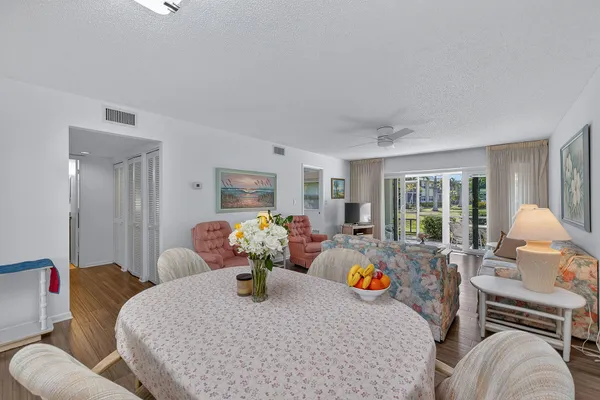 a living room with furniture and a table