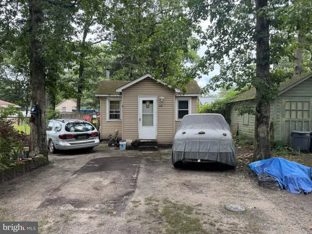 a car parked in front of a house