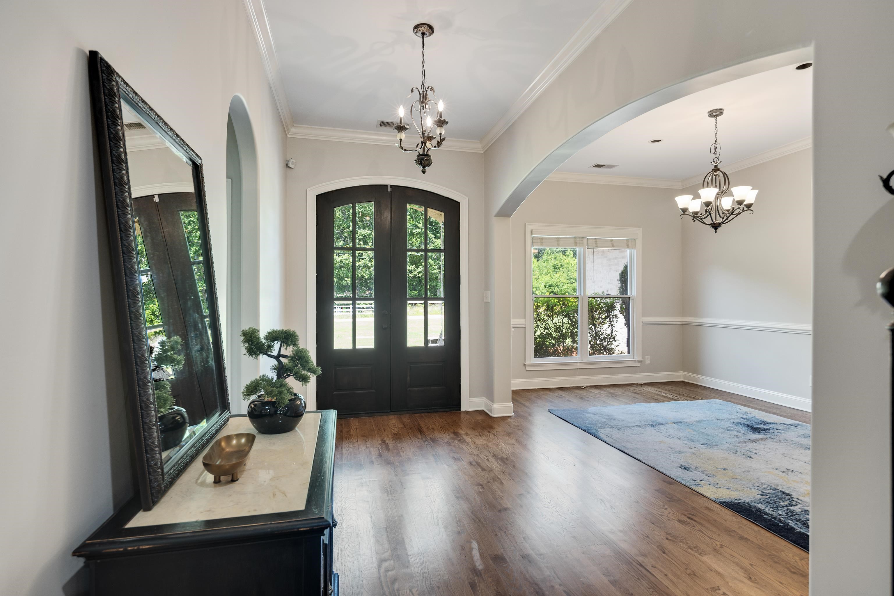 9028 Osborntown Road Arlington, TN 38002 - Photo 5 of 40 a living room with furniture and a chandelier