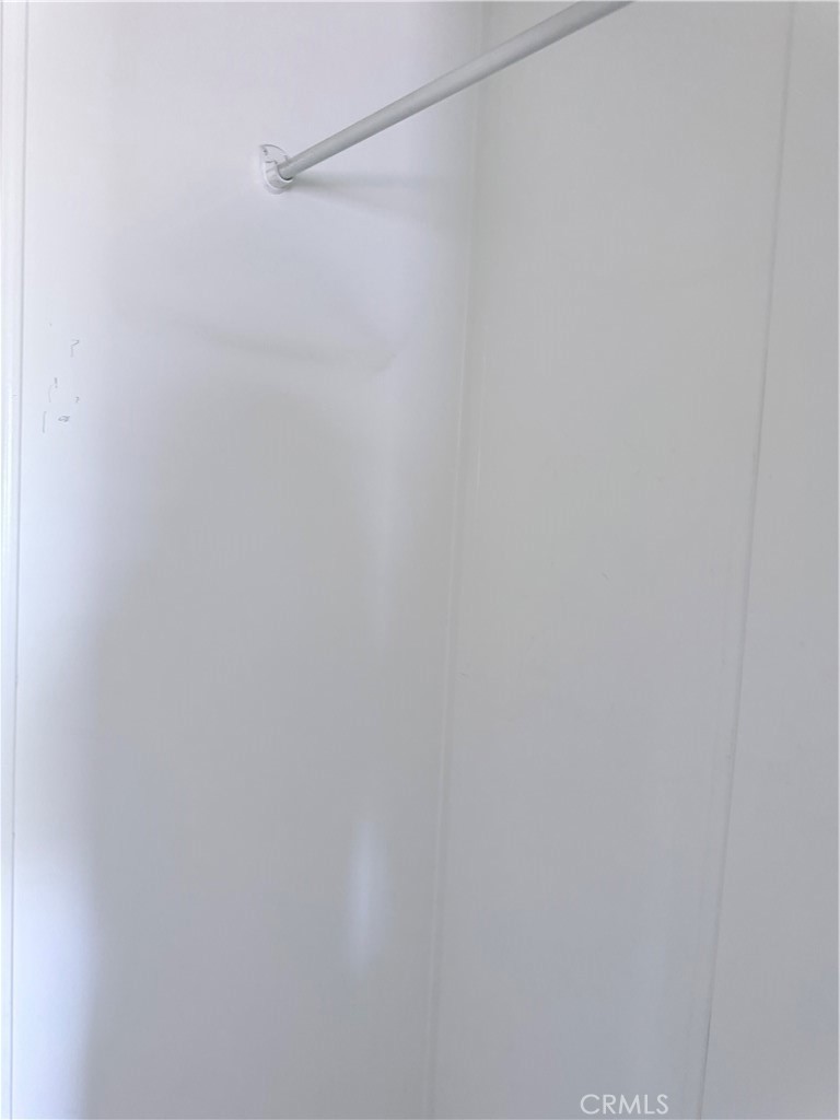 1855 Riverside, Unit 405 Ontario, CA 91761 - Photo 20 of 25 a close up view of racks on the wall