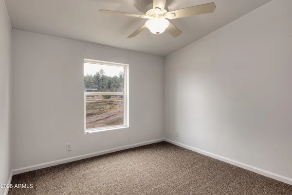 a view of balcony with wooden floor