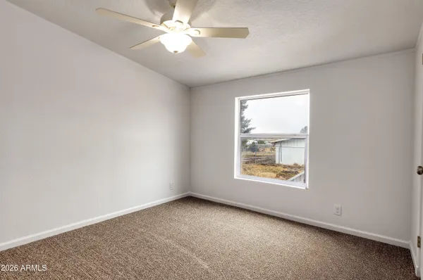 a view of balcony with wooden floor