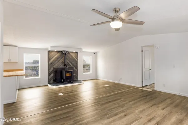 a living room with couch and a window