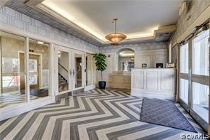 413 Stuart Circle, Unit U2D Richmond, VA 23220 - Photo 20 of 31 One Monument Condominium main entry door, secure e