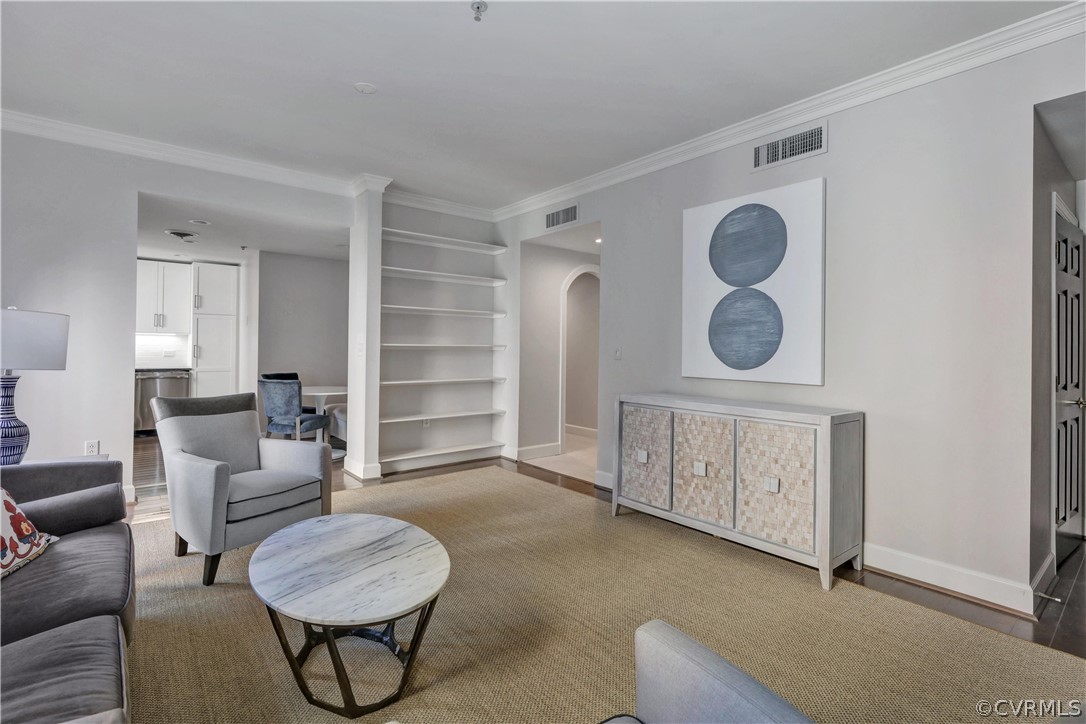 413 Stuart Circle, Unit U2D Richmond, VA 23220 - Photo 10 of 31 Living room view looking towards gallery hallway.