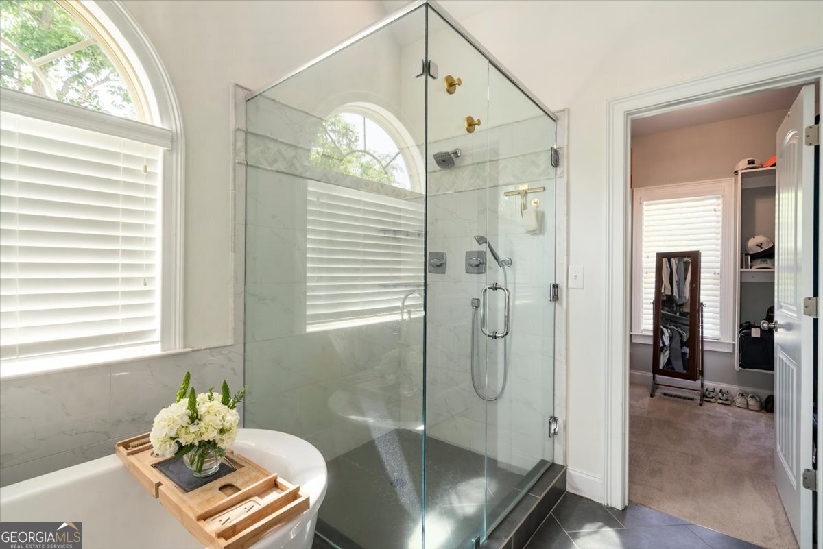 3093 Surry Ridge Drive Watkinsville, GA 30677 - Photo 14 of 41 a bathroom with a shower
