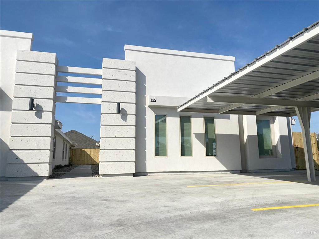 1413 Alta Vista Drive, Unit 2 Weslaco, TX 78596 - Photo 5 of 7 a view of a building entrance